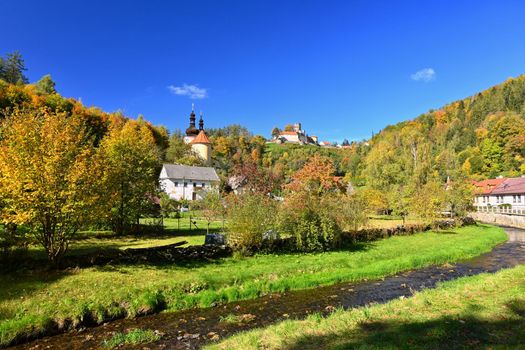 Beautiful old castle in the autumn landscape. Colorful nature. Svojanov - Czech Republic.