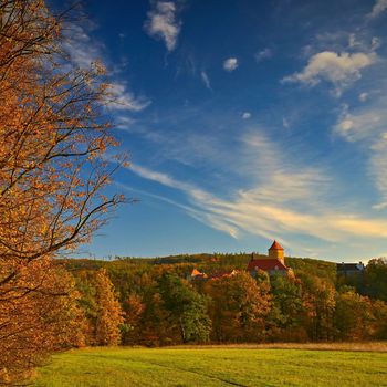 Beautiful Autumn Landscape with Veveri Castle. Natural colorful scenery with sunset. Brno dam-Czech Republic-Europe.