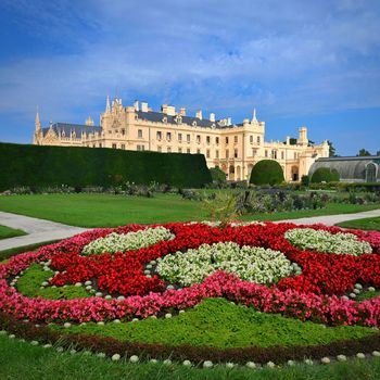 A beautiful castle with a garden and a park. Lednice - Czech Republic - South Moravia. A popular tourist spot for travel and excursions. Landscape with nature in summer time.