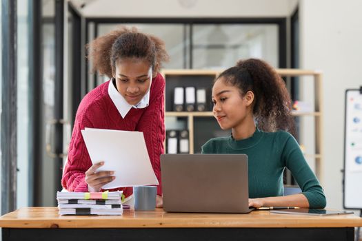 Two Black Girl used laptop for Studying for Exams, Talk in College.
