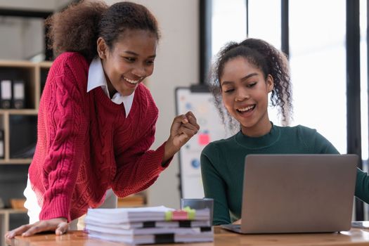 Two Black Business women at casual meeting room discussing and brainstorm idea about marketing. Business consult concept.