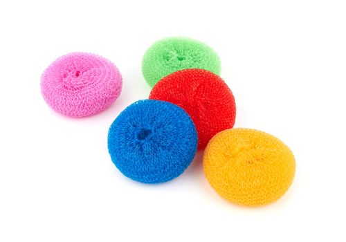 Colorful sponges for washing dishes on a white background