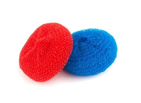 Colorful sponges for washing dishes on a white background