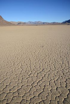 dry mud crack in racetrack playa in death valley national park