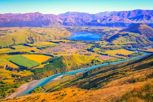 Above Queenstown countryside and river in south Island, Otago, New Zealand at sunset