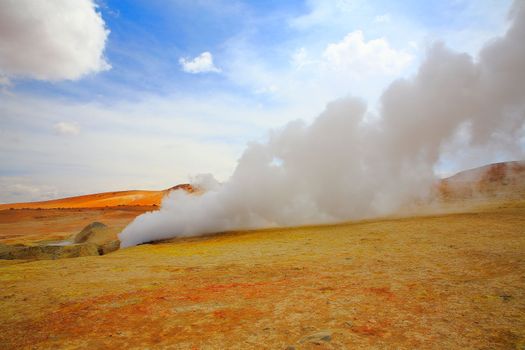 Geysers in Bolivia altiplano, dramatic landscape of bolivian Andes near Atacama of Chile