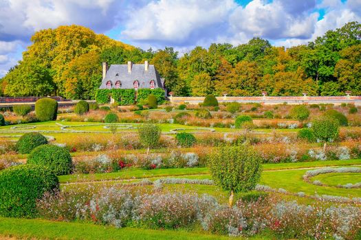 Autumn foliage colors in Loire valley public park with garden landscape, France