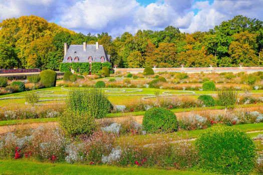 Autumn foliage colors in Loire valley public park with garden landscape, France