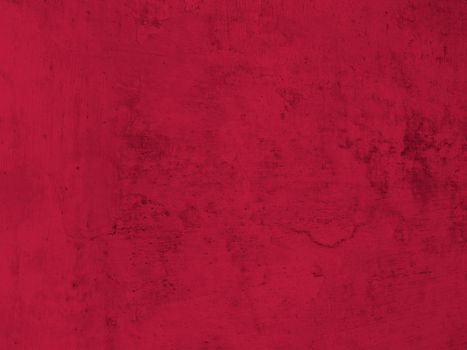 Viva magenta red with a copy space. The texture of wall concrete paint. 2023