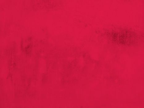 Viva magenta red with a copy space. The texture of old concrete with scratches. 2023