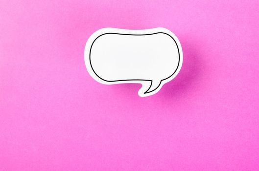 Speech bubble with copy space communication talking speaking concepts on pink colour background.