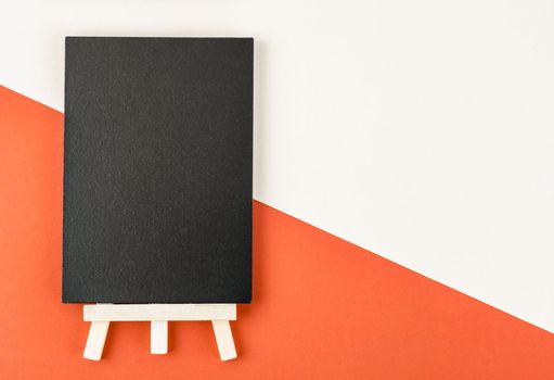 Empty blackboard with a wooden frame on beautiful background for your text or message.