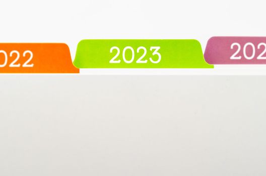 File folders with selective focus a tab labeled 2023.