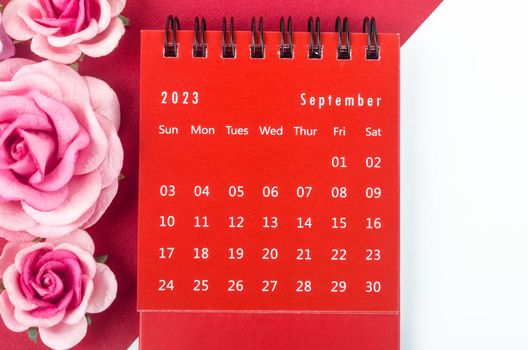 Red September 2023 Monthly desk calendar for 2023 year with pink rose.