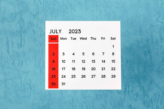 July 2023 Monthly calendar for 2023 year on blue background..