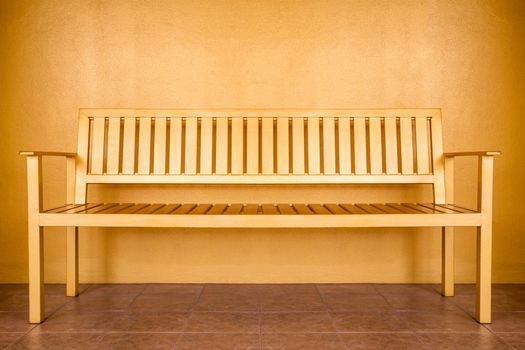 Blank Gold color Bench in golden room.