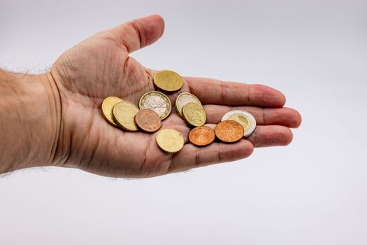Living from hand to mouth means poverty with little euro money in coins at high inflation
