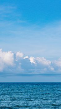 BANNER, VERTICAL STORY Atmosphere panorama white cloud clear blue sky horizon line calm empty sea. Concept paradise life. Design relax wallpaper background. More tone format in stock.