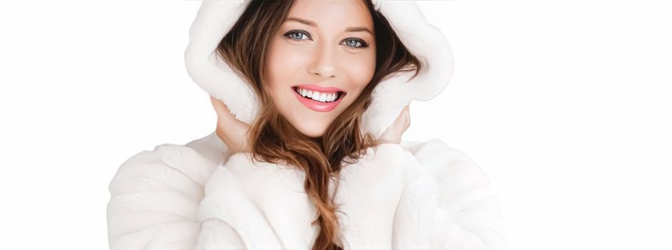 Winter fashion and beauty, beautiful woman in white fur coat.