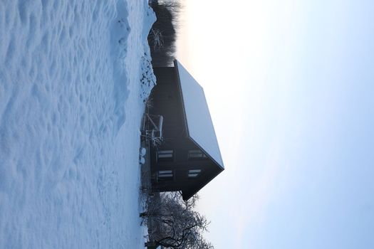 Barnhouse. Wooden secluded house in the Scandinavian and Finland modern style with large windows. Exterior, wooden walls
