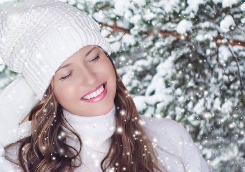 Winter holiday travel, lifestyle and fashion, beautiful happy woman and snowy forest, nature, ski resort and leisure activity outdoors Christmas, New Year and holidays portrait.