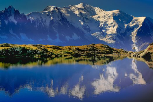 Mont Blanc and idyllic lake Cheserys reflection, Chamonix, French Alps at sunset
