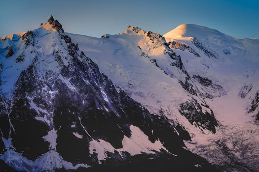 Mont Blanc massif idyllic alpine landscape at dramatic sunrise, Chamonix, French Alps