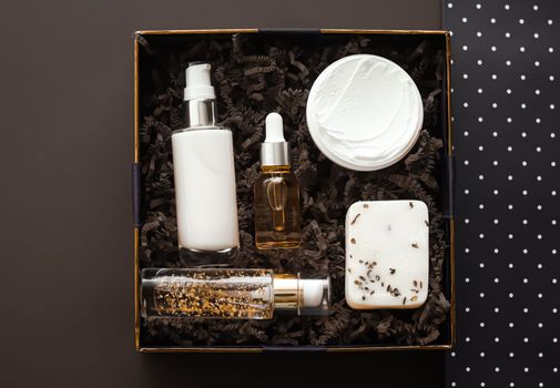 Beauty box subscription package and luxury skincare products, spa and cosmetic body care product flat lay on brown background, wellness cosmetics as holiday gift, online shopping delivery, flatlay view