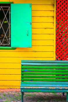 Colorful facade on Caminito Street of La Boca with seat bench, in Buenos Aires city, Argentina, South America