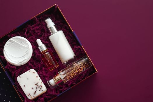 Beauty box subscription package and luxury skincare products, spa and cosmetic body care product flat lay on purple background, wellness cosmetics as holiday gift, online shopping delivery, flatlay view