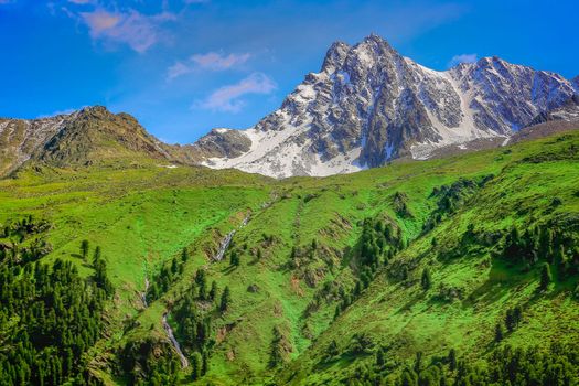 Snowcapped mountains in Kaunertal valley at springtime sunny day , Tyrol, Austria