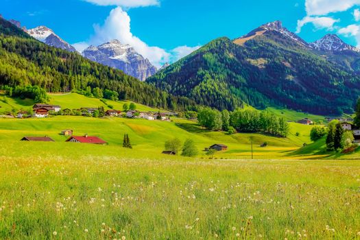 Alpine farm in Green Stubai valley near Innsbruck at sunset, Tyrol, Austria