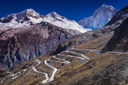Portachuelo winding Road, mountain pass in Huascaran, Cordillera Blanca, snowcapped Andes, Ancash, Peru