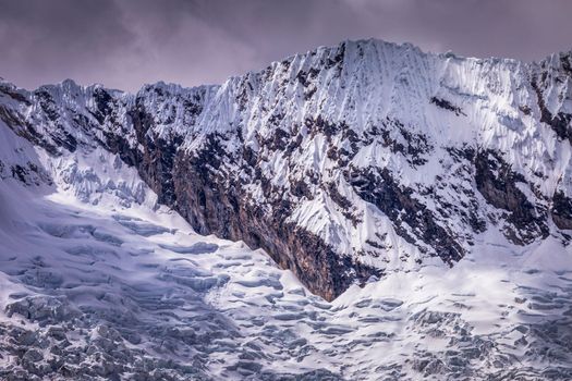 Snowcapped mountain peak with glacier in Cordillera Blanca near Huaraz, Ancash Andes, Peru