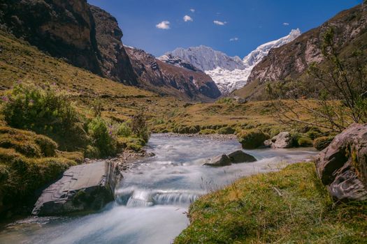 River and Huascaran Mountain massif in Cordillera Blanca, snowcapped Andes, Ancash, Peru, South America