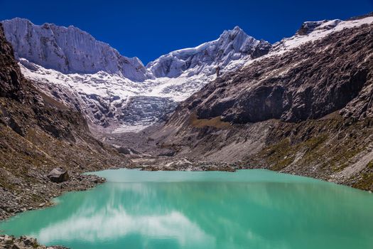 Idyllic laguna Llaca in Cordillera Blanca, snowcapped Andes, Ancash, Peru