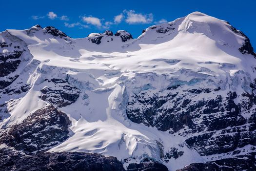 Snowcapped mountain peak with glacier in Cordillera Blanca near Huaraz, Ancash Andes, Peru
