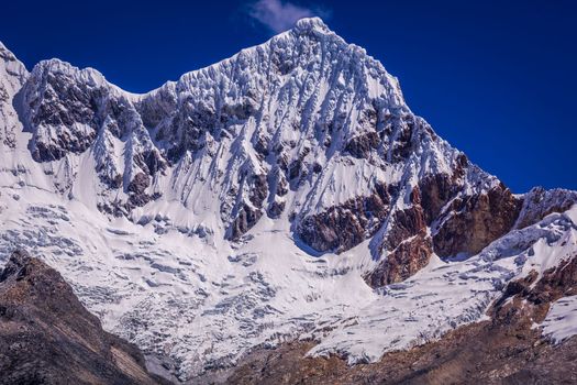 Snowcapped mountain peak with glacier in Cordillera Blanca near Huaraz, Ancash Andes, Peru