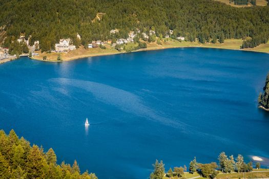 Sailing on St Moritz lake, view above Engadine alps, Graubunden , Switzerland