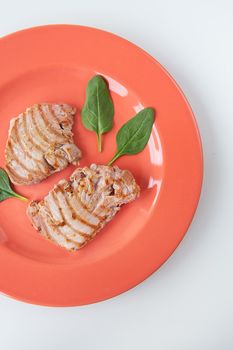 Close-up of a juicy delicious grilled tuna steak on a bright plate. Delicious and healthy food, proper nutrition