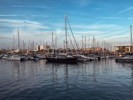 boats and yachts in the harbour of barcelona spain . High quality photo