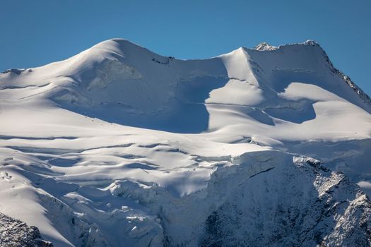 Bernina and Palu mountain range with glaciers in the Swiss Alps, Engadine, Switzerland