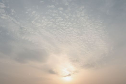 scenic evening sunset sky with sun and clouds. magestic dusk cloudscape.