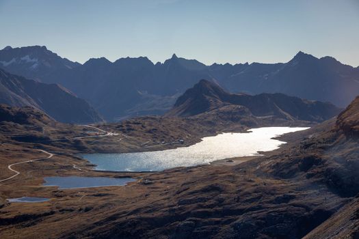 Bernina and Palu mountain range with white lake in the Swiss Alps, Engadine, Switzerland
