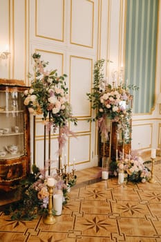 A place decorated with flowers for a wedding ceremony in the interior of the castle.