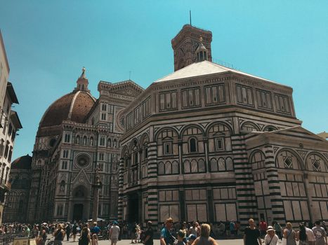 Florence city hall in the middle of town in summer time with people out enjoying the view. High quality photo