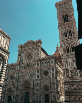 Florence city hall in the middle of town in summer time with people out enjoying the view. High quality photo