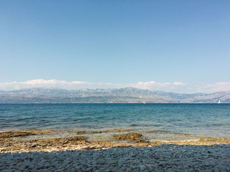 Brac Island Croatia in the middle of summer. With boats and people enjoying summer in the sandy bay. . High quality photo