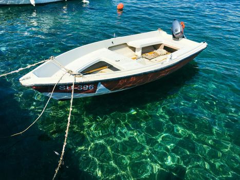 Brac Island Croatia in the middle of summer. With boats and people enjoying summer in the sandy bay. . High quality photo