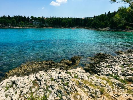 Brac Island Croatia in the middle of summer. With boats and people enjoying summer in the sandy bay. . High quality photo